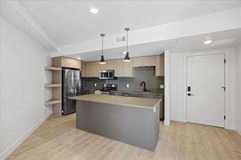 Kitchen with modern appliances and cabinets1